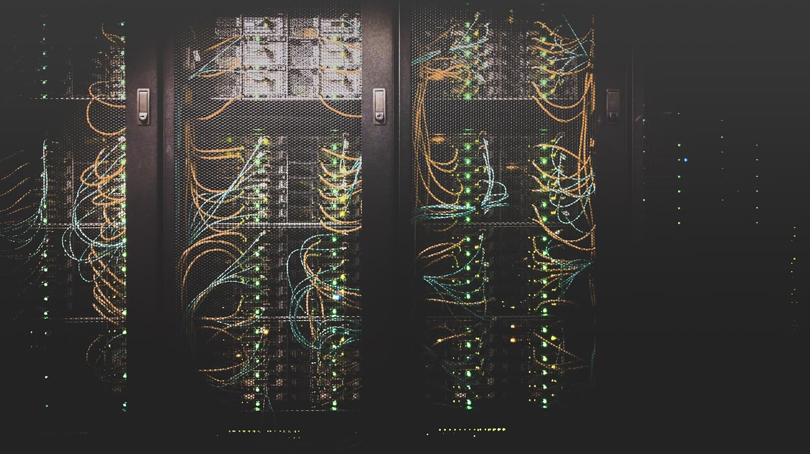 Data centre racks representing the legacy platform being retired during an enterprise legacy migration